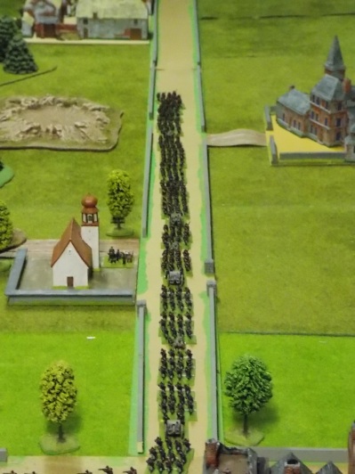 11. Belgians advancing to defend the town
