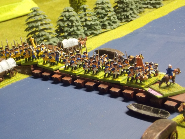 27. The pontoon bridge now finished the Hessians start to cross.